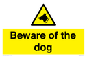 beware-of-the-dog-with-dog-warning-symbol~